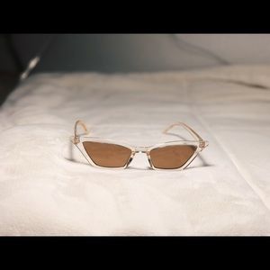 Transparent/tan cat eye sunglasses